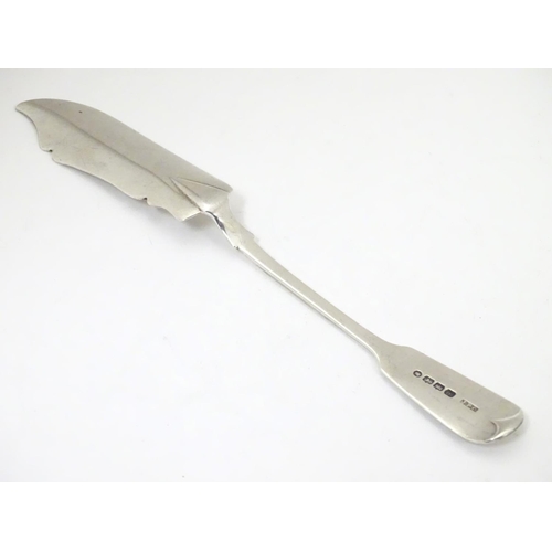 448 - A silver fiddle pattern butter knife hallmarked Exeter 1881, maker John Pope Genge. 7 3/4