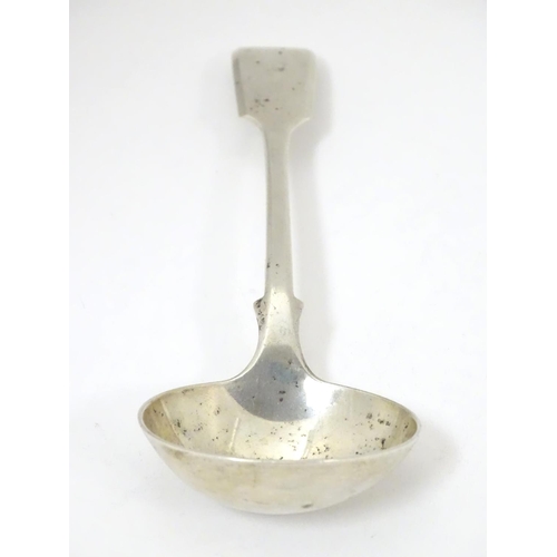 449 - A silver fiddle pattern sauce ladle, hallmarked London 1901, maker Robert Stebbings. 7 1/4