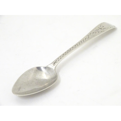 461 - A George III silver teaspoon with bright cut decoration, hallmarked London 1797.4 1/2