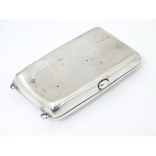 467 - An Edwardian silver cheroot / cigarette case with engraved armorial detail, hallmarked Birmingham 19... 