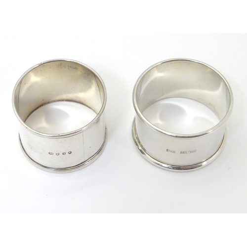 472 - Two silver napkin rings, one hallmarked London 1844, the other Birmingham 1986 (2)