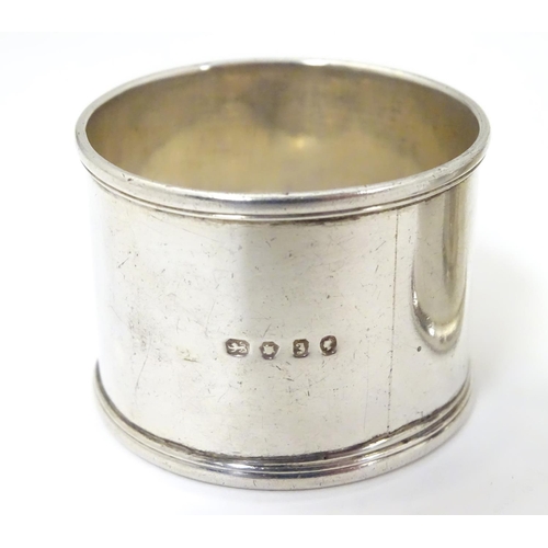 472 - Two silver napkin rings, one hallmarked London 1844, the other Birmingham 1986 (2)