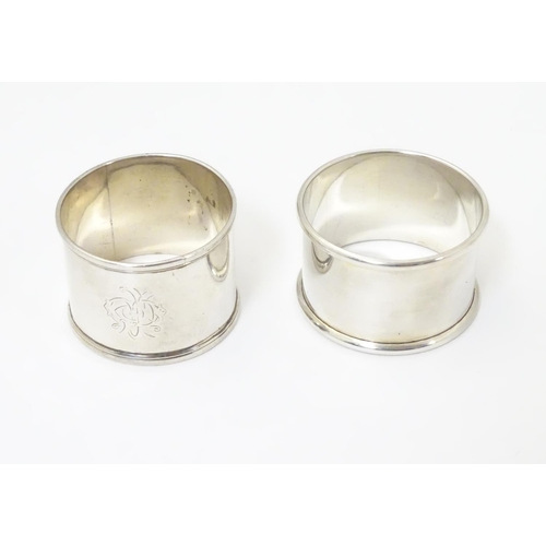 472 - Two silver napkin rings, one hallmarked London 1844, the other Birmingham 1986 (2)