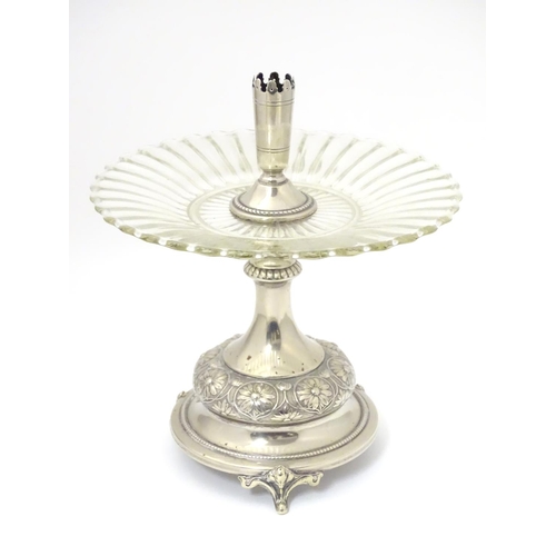 476 - A late 19thC / early 20thC silver plate and glass centre piece with provision for epergne glass flut... 