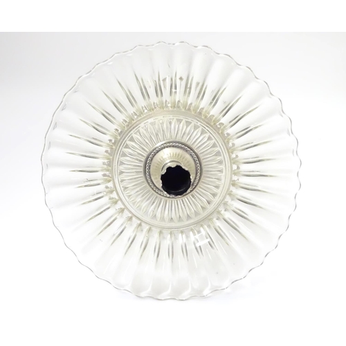 476 - A late 19thC / early 20thC silver plate and glass centre piece with provision for epergne glass flut... 