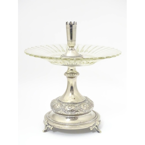 476 - A late 19thC / early 20thC silver plate and glass centre piece with provision for epergne glass flut... 