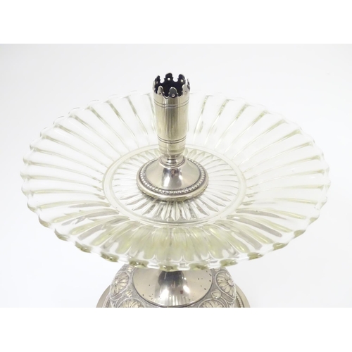 476 - A late 19thC / early 20thC silver plate and glass centre piece with provision for epergne glass flut... 