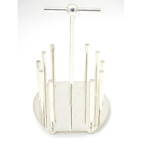 477 - A late 20thC Silver plated toast / letter rack made to a design by Christopher Dresser. 6 1/2