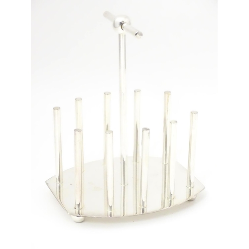 477 - A late 20thC Silver plated toast / letter rack made to a design by Christopher Dresser. 6 1/2