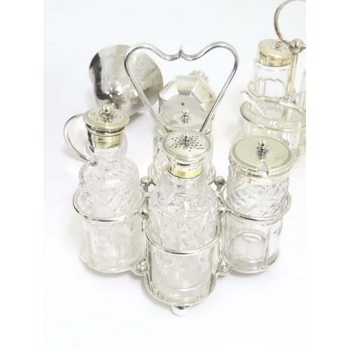 492 - Assorted silver plated wares to include cruets, bud vase, caster, glass and silver plate preserve po... 