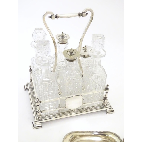 495 - Assorted silver plated wares to include table forks, 3 piece tea set and 6 bottle cruet stand and bo... 