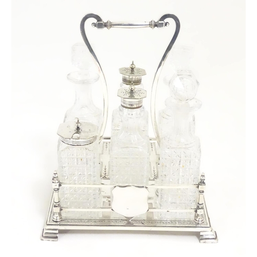 495 - Assorted silver plated wares to include table forks, 3 piece tea set and 6 bottle cruet stand and bo... 