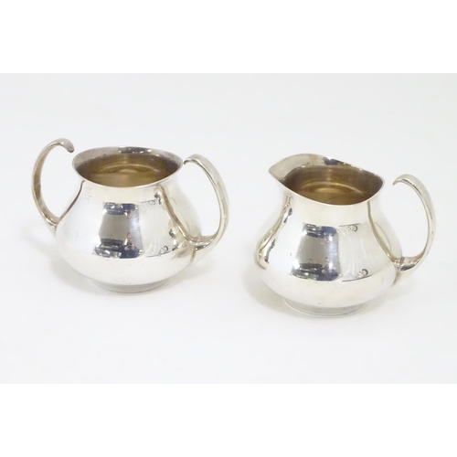 497 - Eric Clements:  Eric Clements for Elkington & Co modernist silver plated three piece bachelor tea se... 