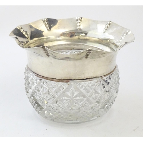 191 - A cut glass bowl with flared silver rim hallmarked Birmingham 1903 maker George Nathan & Ridley Haye... 