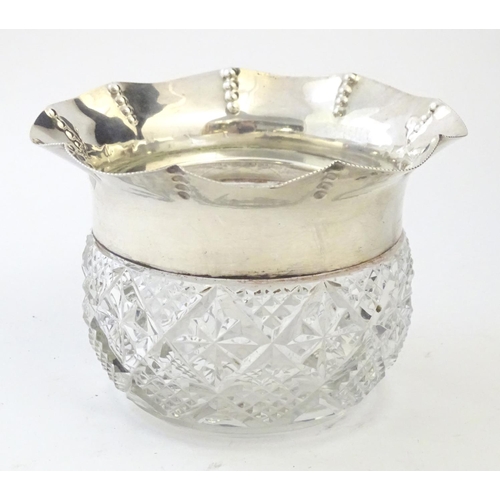 191 - A cut glass bowl with flared silver rim hallmarked Birmingham 1903 maker George Nathan & Ridley Haye... 