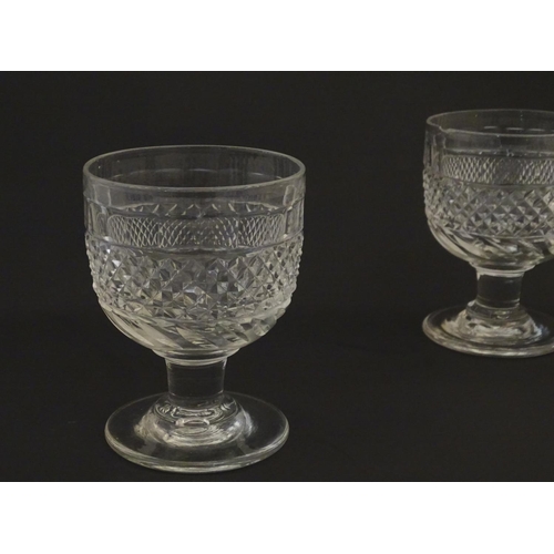 210 - 6 19thC pedestal drinking glasses / rummers with hobnail cut decoration. Approx 4 3/4