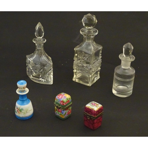 217 - Assorted glass scent bottes together with together with two perfume / scent bottle in enamel contain... 