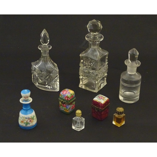 217 - Assorted glass scent bottes together with together with two perfume / scent bottle in enamel contain... 