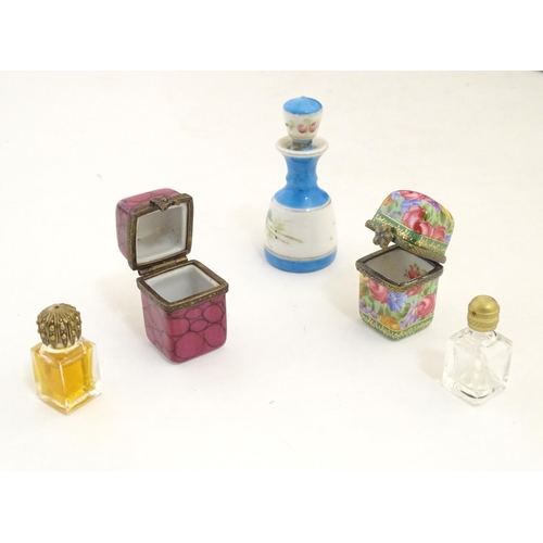 217 - Assorted glass scent bottes together with together with two perfume / scent bottle in enamel contain... 