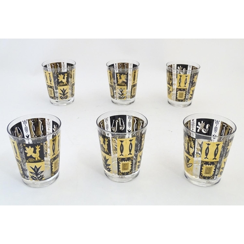 221 - A set of 6 20thC drinking glasses gilt and black decoration. 4 1/2