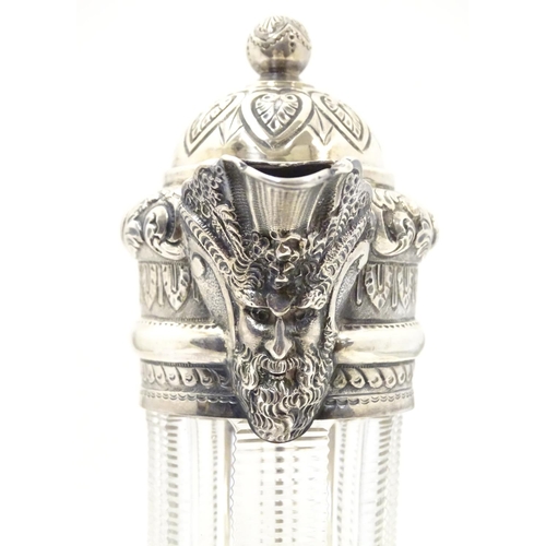 300 - Manner of Thomas Webb : A Victorian cut glass and silver mounted claret jug, the body of the jug dec... 