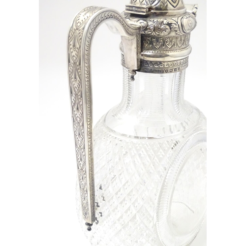 300 - Manner of Thomas Webb : A Victorian cut glass and silver mounted claret jug, the body of the jug dec... 