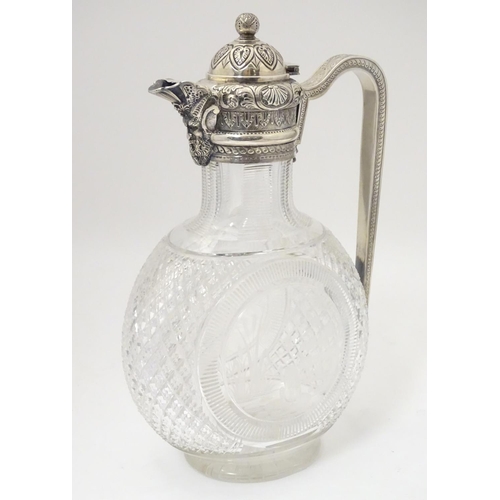 300 - Manner of Thomas Webb : A Victorian cut glass and silver mounted claret jug, the body of the jug dec... 