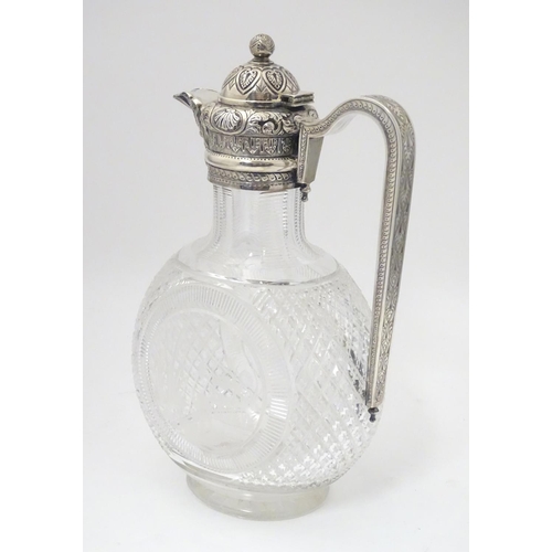 300 - Manner of Thomas Webb : A Victorian cut glass and silver mounted claret jug, the body of the jug dec... 