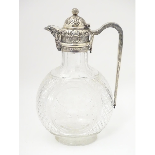 300 - Manner of Thomas Webb : A Victorian cut glass and silver mounted claret jug, the body of the jug dec... 