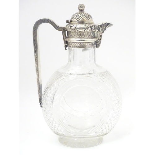 300 - Manner of Thomas Webb : A Victorian cut glass and silver mounted claret jug, the body of the jug dec... 