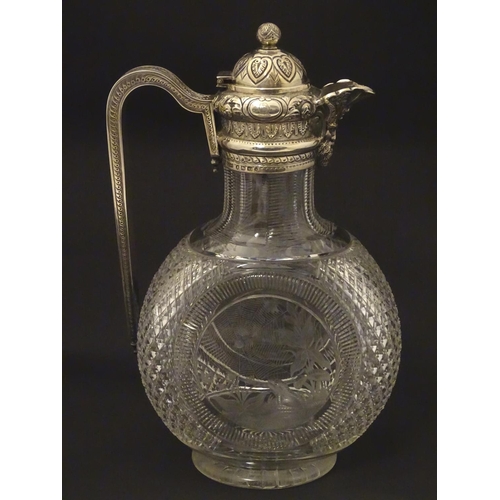 300 - Manner of Thomas Webb : A Victorian cut glass and silver mounted claret jug, the body of the jug dec... 