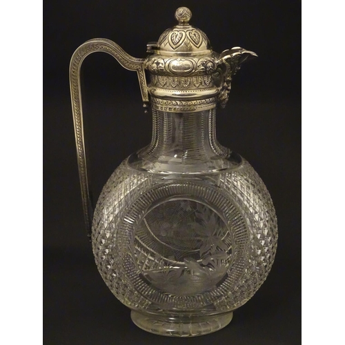 300 - Manner of Thomas Webb : A Victorian cut glass and silver mounted claret jug, the body of the jug dec... 