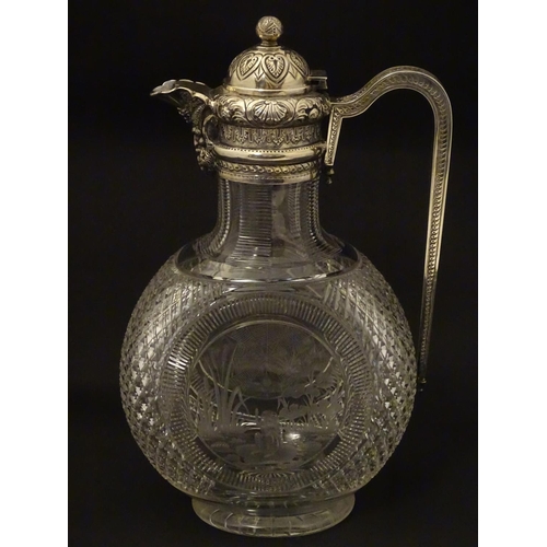 300 - Manner of Thomas Webb : A Victorian cut glass and silver mounted claret jug, the body of the jug dec... 