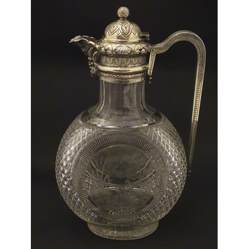 300 - Manner of Thomas Webb : A Victorian cut glass and silver mounted claret jug, the body of the jug dec... 