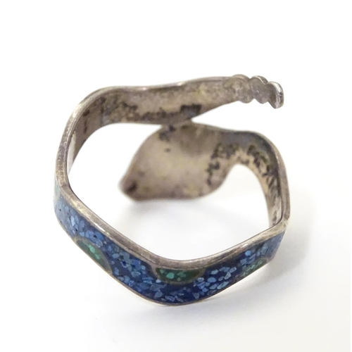 536 - A Mexican silver ring formed as a snake with enamel decoration . Stamped inside MEXICO 925 TR-60. Ri... 