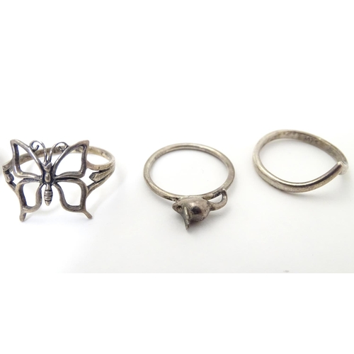 537 - Six assorted silver and white metal rings with various decoration including one set with goldstone c... 