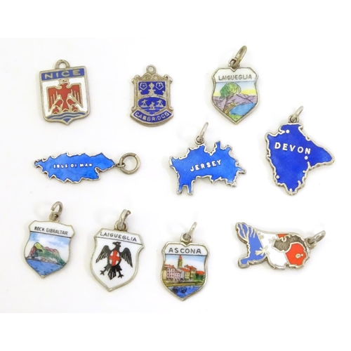 554 - Assorted silver and silver plate charms including 3 silver pendant charms with blue enamel decoratio... 