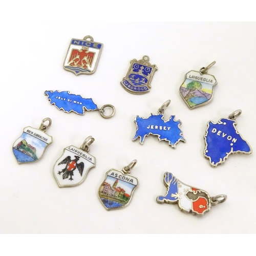 554 - Assorted silver and silver plate charms including 3 silver pendant charms with blue enamel decoratio... 