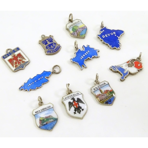 554 - Assorted silver and silver plate charms including 3 silver pendant charms with blue enamel decoratio... 