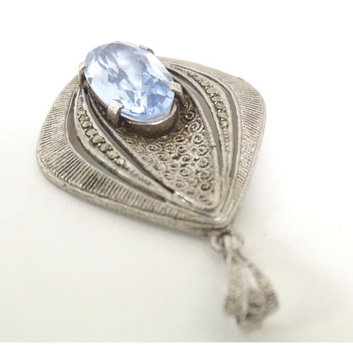 561 - Fahrner Theodor : A 20thC silver pendant set with aquamarine stone and marcasite detail. marked TH s... 