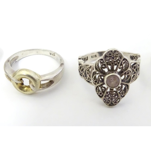 571 - 6 assorted silver and white metal rings, one with cameo detail another with agate. (6)