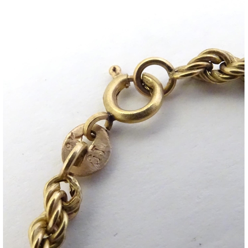 574 - Assorted 9ct gold and gilt metal jewellery including a 9ct gold bracelet of rope twist form, 9ct gol... 