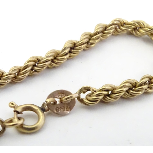 574 - Assorted 9ct gold and gilt metal jewellery including a 9ct gold bracelet of rope twist form, 9ct gol... 