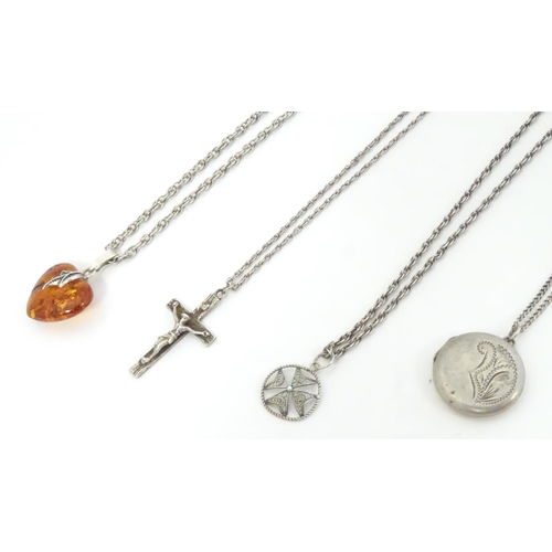 578 - Assorted silver and white metal pedants and chains including pendants formed as a crucifix, locket, ... 