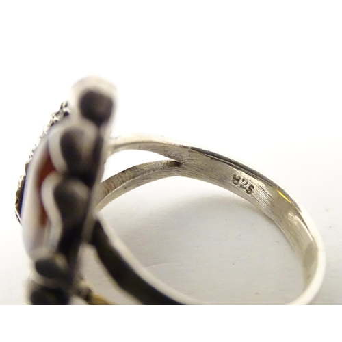 626 - Four assorted silver and white metal dress rings