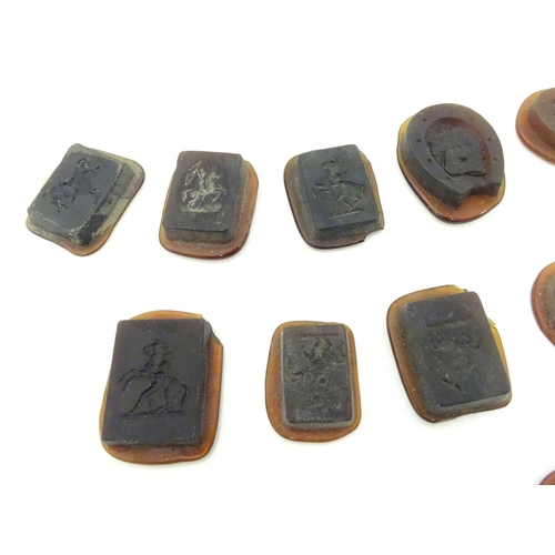 634 - A quantity of assorted intaglio seals depicting equine subjects  etc depicting various classical bus... 