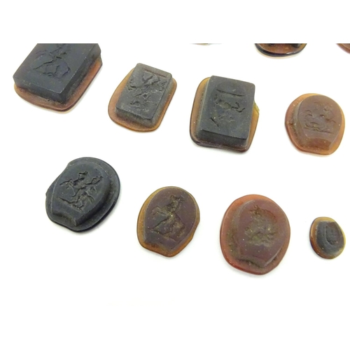 634 - A quantity of assorted intaglio seals depicting equine subjects  etc depicting various classical bus... 