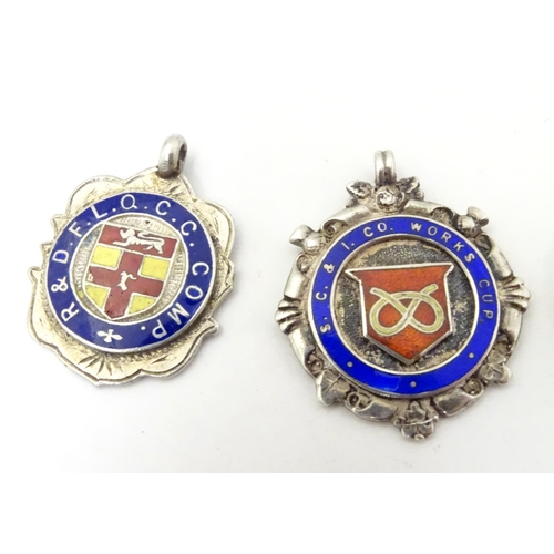 648 - An assortment of early 20thC hallmarked silver fob medals, each obverse with enamelled insignia, the... 