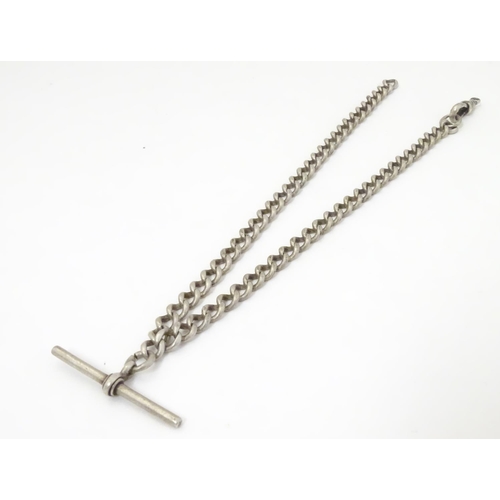 653 - A hallmarked silver curb link watch chain / albert, 14