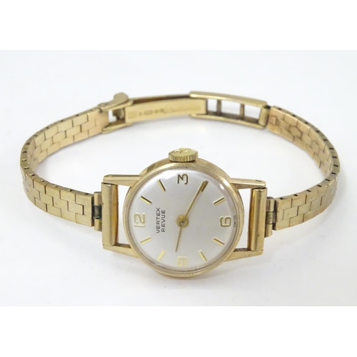 654 - A mid 20thC Vertex Revue 9ct gold ladies' watch, cased, the face measuring 3/4